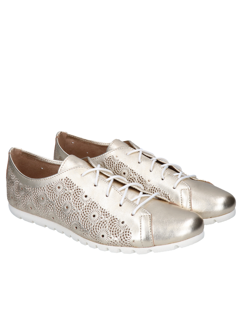 Gold women's sneakers - a combination of classic and modern Gold women's sneakers - a combination of classic and modern