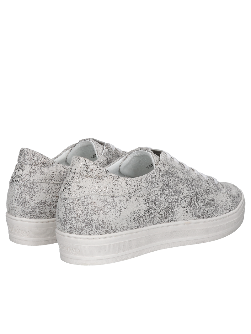 Silver women's sneakers on a white sole, natural leather