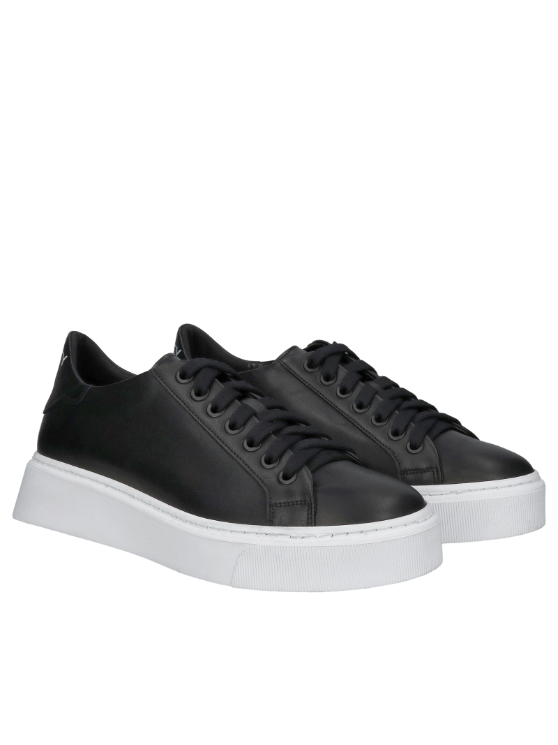 Fashionable black grain leather sneakers on white thick sole