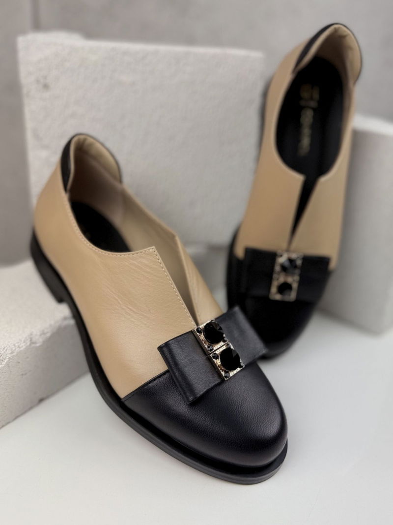 Women's leather half shoes with a beautiful decorative leather bow on the front