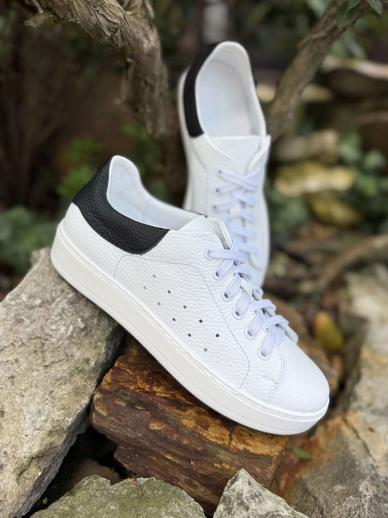 Women's white leather sneakers with a comfortable sole, soft natural leather, removable leather insole