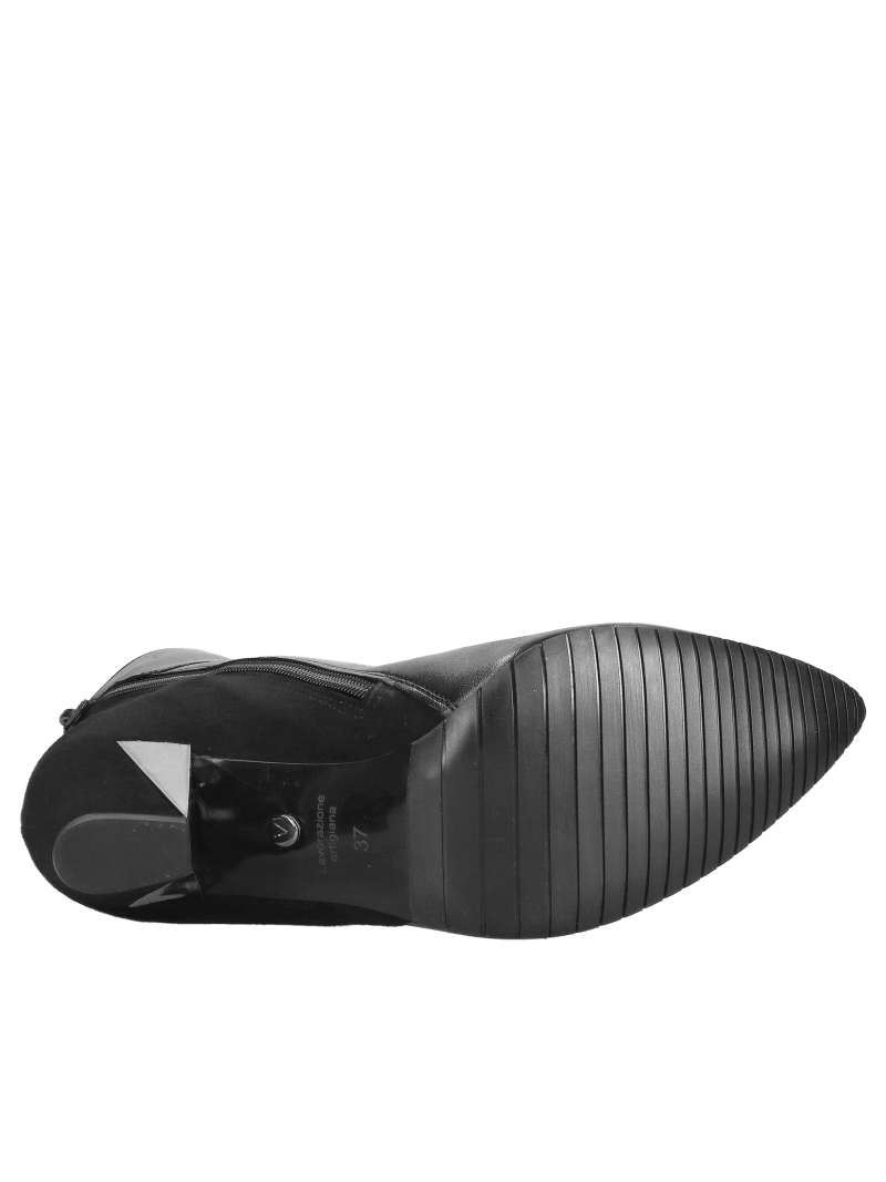 Elegant suede ankle boots with decorative heels, combining elegance and comfort in one