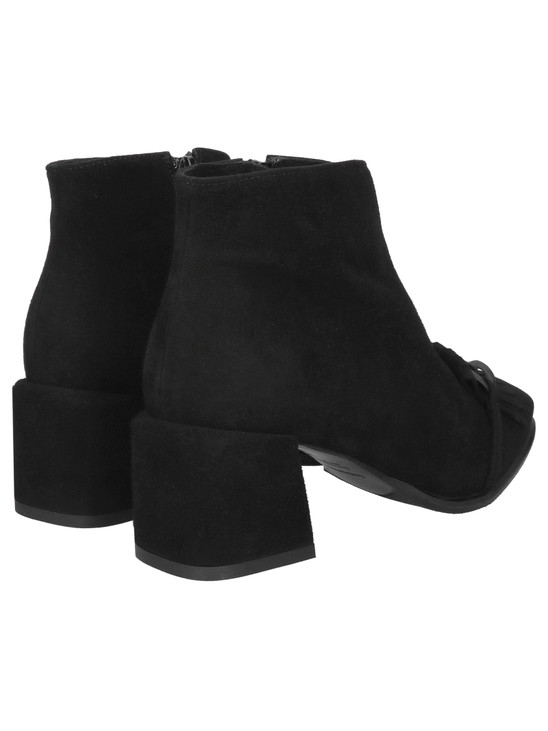 Women's black ankle boots with a block heel and decorative chain on the toe