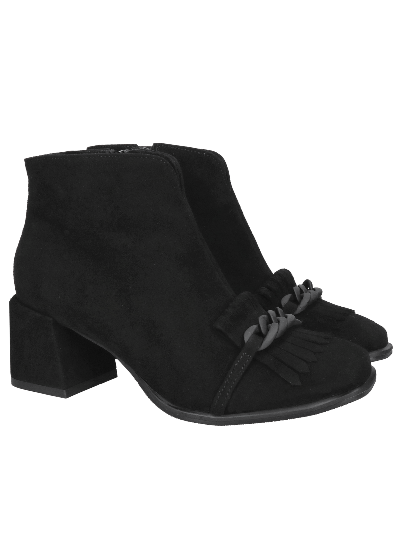 Women's black ankle boots with a block heel and decorative chain on the toe