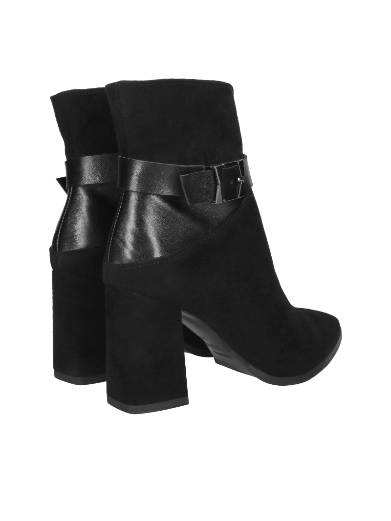 Suede ankle boots with a high, stylish heel and eye-catching embellishment