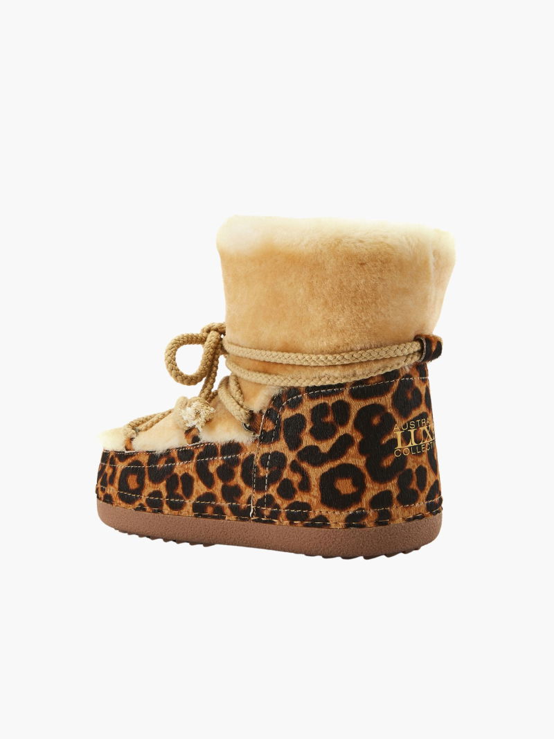 Winter boots on a platform, women's snow boots with natural sheepskin lining