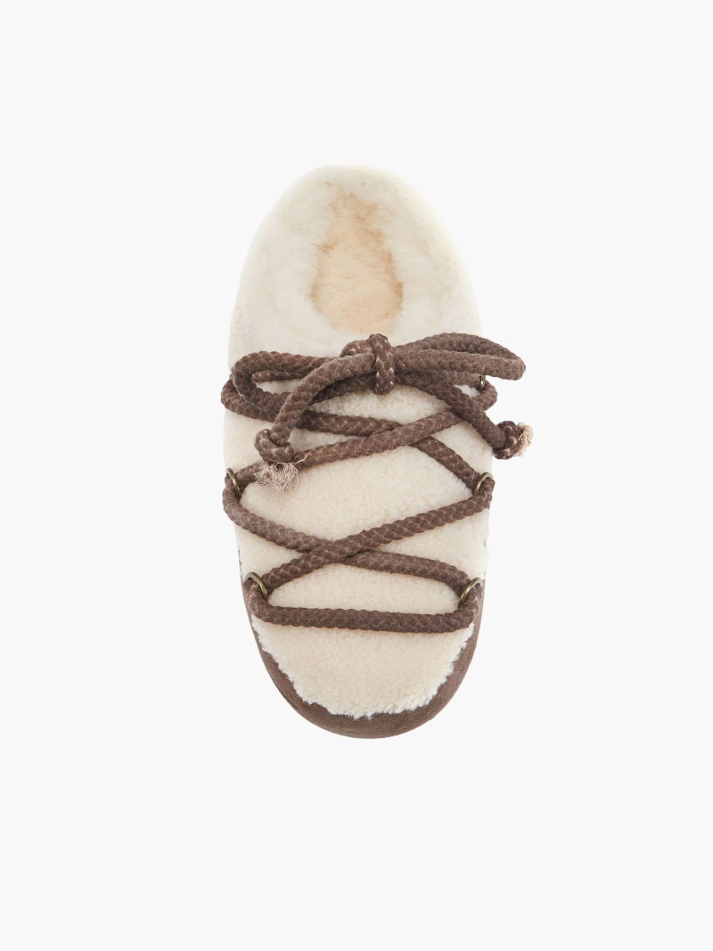 A version of the best-selling Manon model by Luxe. Snow boot-style shoes with suede and sheepskin uppers, Konopka Shoes