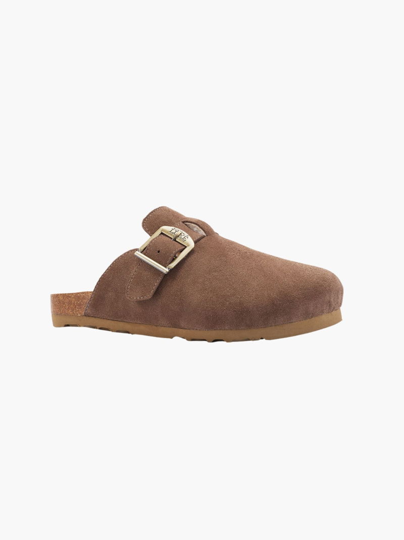 Soft suede clogs with a side buckle. Comfortable sheepskin insole and molded sole.