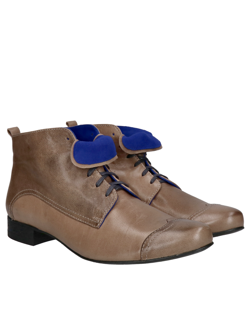 Low, unlined leather ankle boots with decorative cobalt suede trim