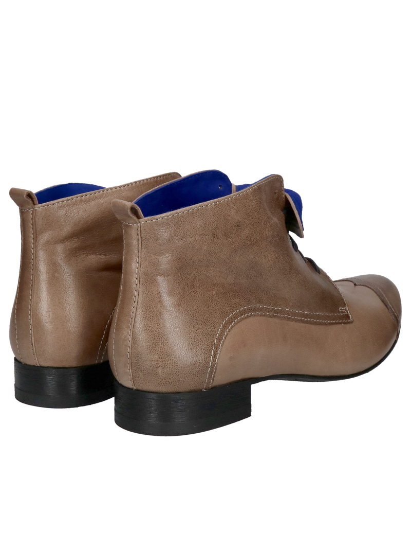 Low, unlined leather ankle boots with decorative cobalt suede trim