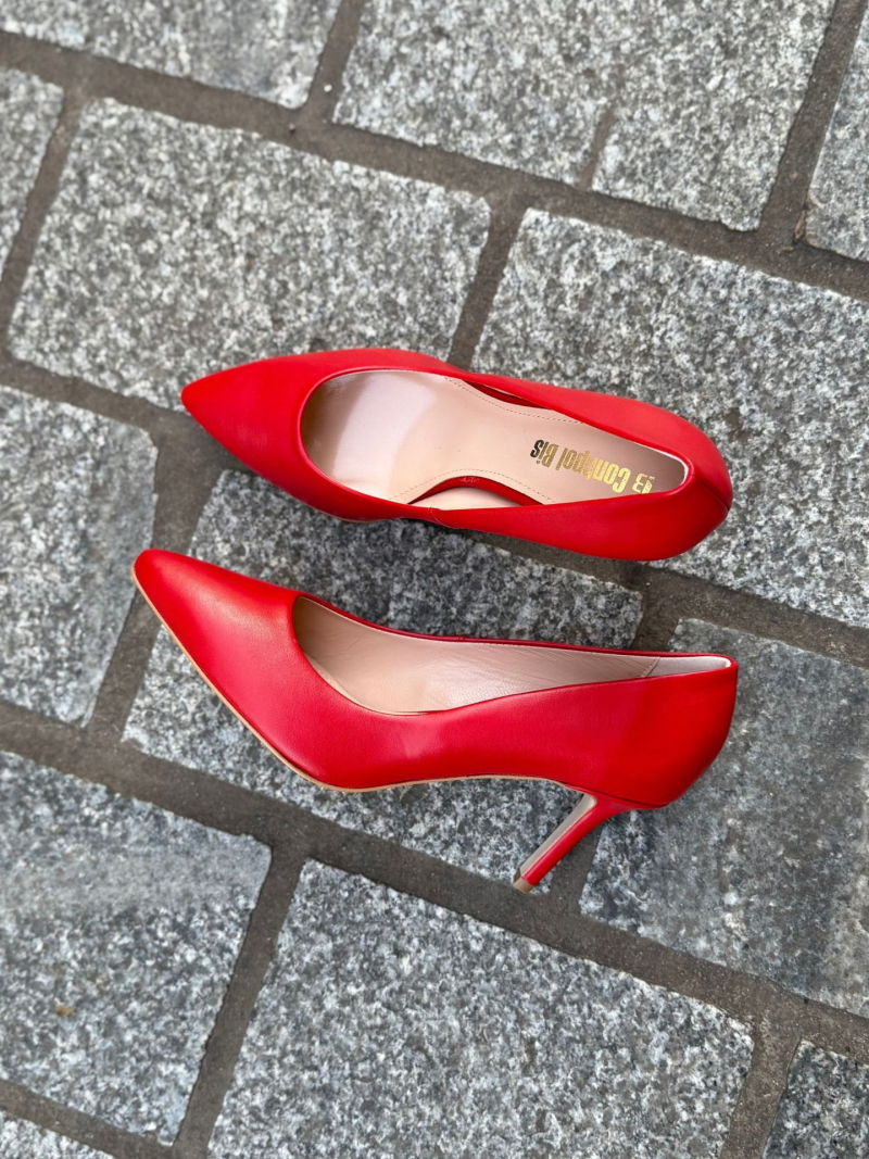Red pumps with comfortable heels, red stilettos made of natural leather