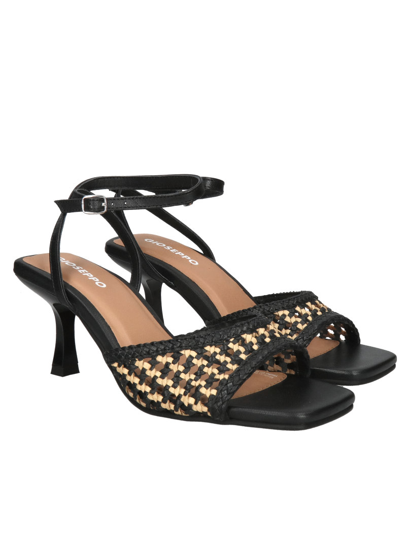 Delicate high-heeled sandals made of woven leather, black sandals to wear with a dress