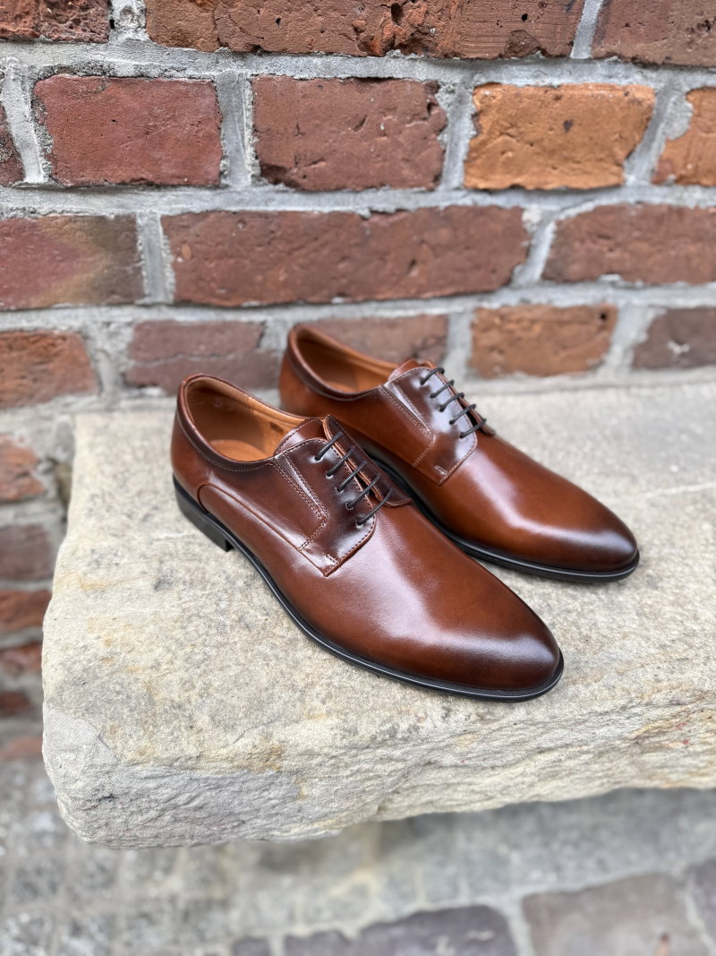 Elegant brown men's dress shoes, formal footwear for men from a Polish manufacturer