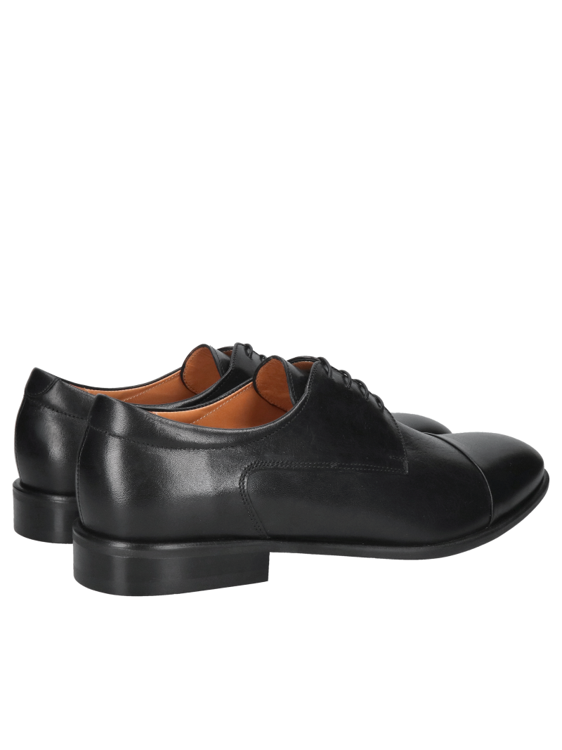 Elegant black men's dress shoes, formal shoes with a cut-out detail made of genuine leather