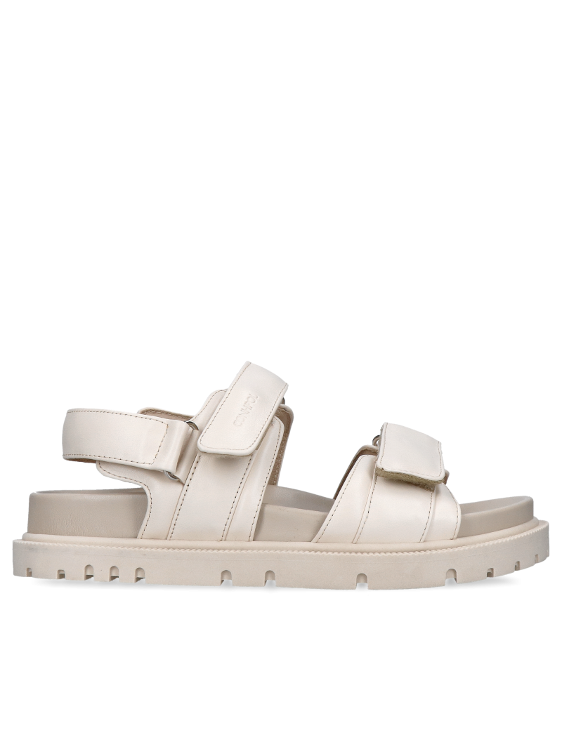 Stylish, chunky cream-colored sandals made of soft full-grain leather; premium sandals with a thick sole
