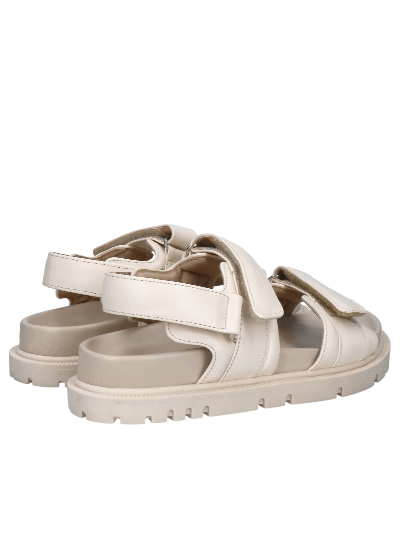 Stylish, chunky cream-colored sandals made of soft full-grain leather; premium sandals with a thick sole