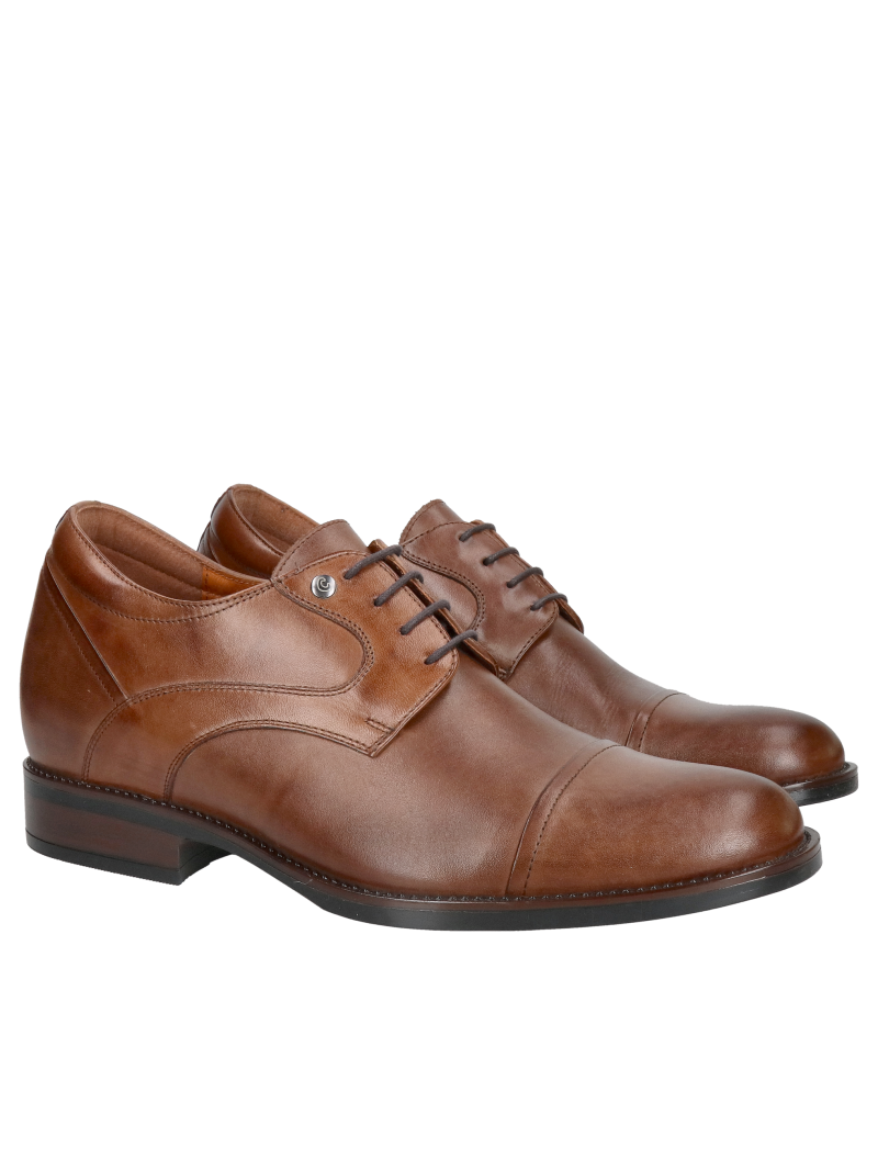 Elegant brown dress shoes with a raised heel, made of full-grain leather