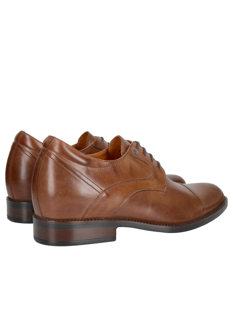 Elegant brown dress shoes with a raised heel, made of full-grain leather