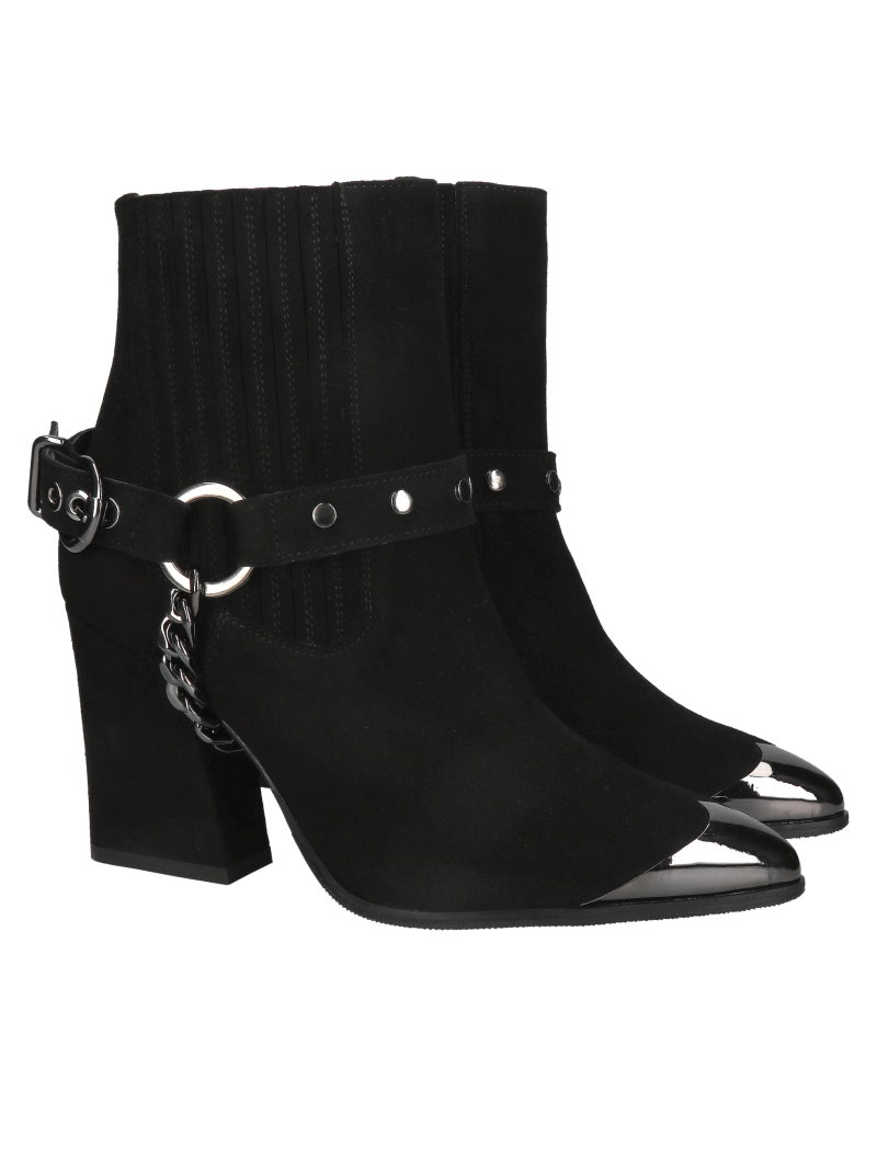 Black suede women's pointed-toe ankle boots with elastic bands on the upper, a chain, and a metal detail on the toes.