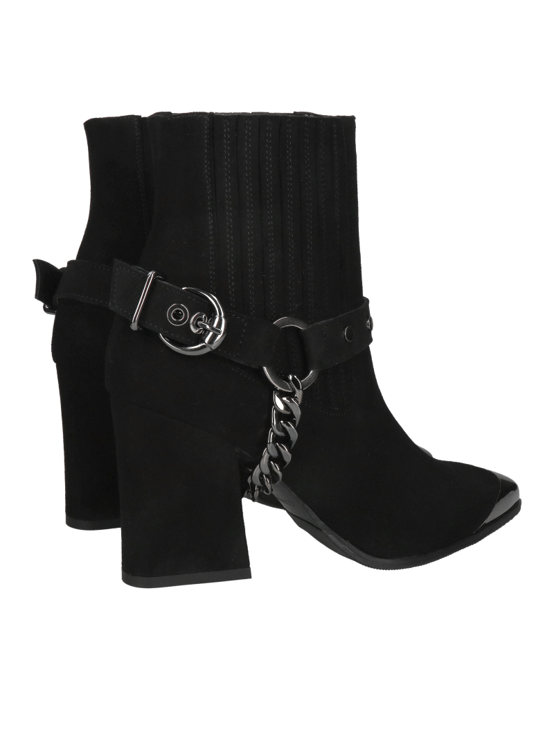 Black suede women's pointed-toe ankle boots with elastic bands on the upper, a chain, and a metal detail on the toes.