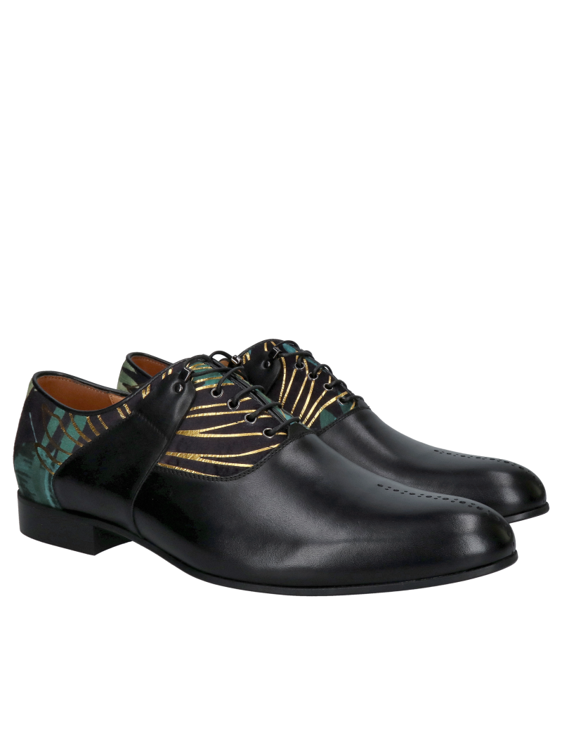 A unique pair of men’s Oxford shoes, made from black full-grain leather combined with decorative suede