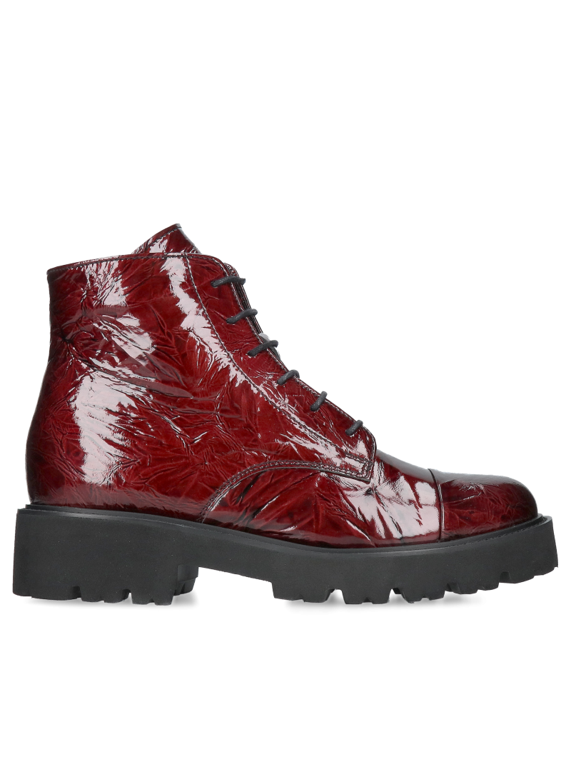Women's burgundy patent leather ankle boots with a thick, lightweight sole