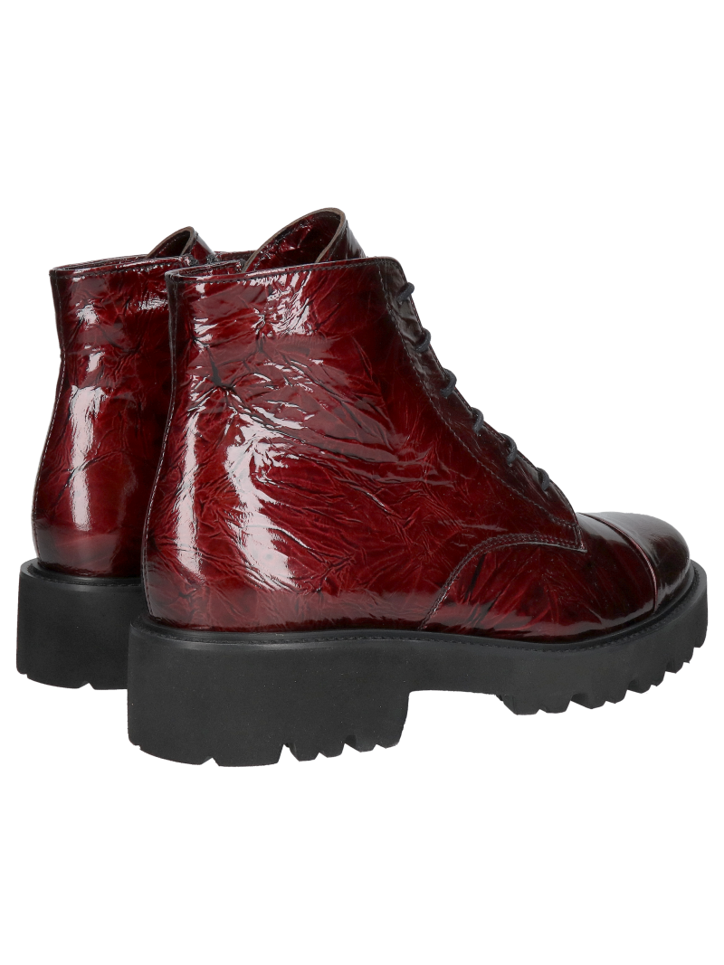 Women's burgundy patent leather ankle boots with a thick, lightweight sole