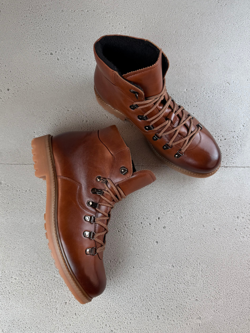 Brown lace-up boots made of full-grain leather with light insulation; ankle boots without a zipper