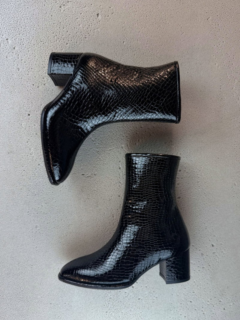Elegant black women's heeled ankle boots, patent leather ankle boots made of soft leather, comfortable ankle boots