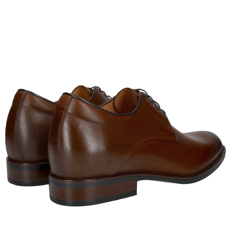 Eleganckie obuwie ślubne dla mężczyzn, zapewniające dyskretne podwyższenie wzrostu, podkreślające indywidualny styl