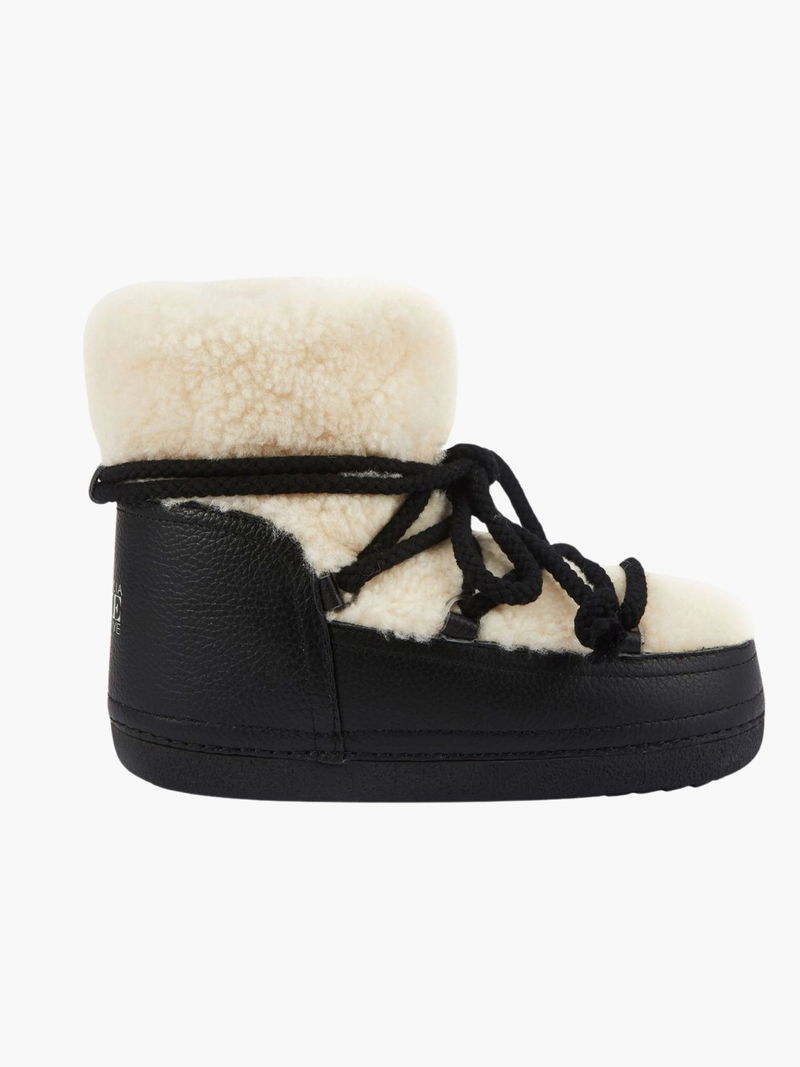 Stylowe śniegowce damskie Australia Luxe z cholewką z miękkiej skóry i naturalnego kożucha ze skóry owczej.